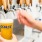a person pouring a beer