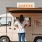 A coffee van near our apartments for rent in North Charleston, SC, featuring someone ordering a drink.