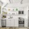 Model kitchen at our apartments for rent in North Charleston, SC, featuring white cabinets and stainless steel appliances.